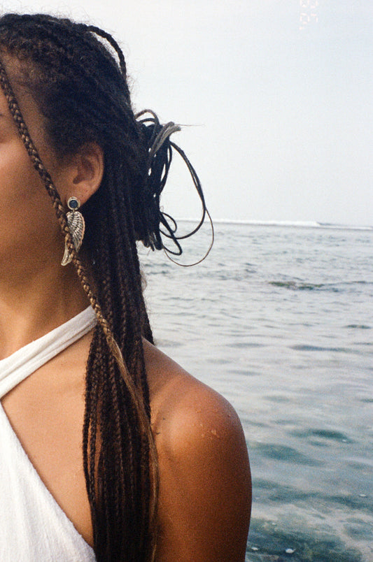 woman earrings wings angel isis kyanite crystal silver beach ocean